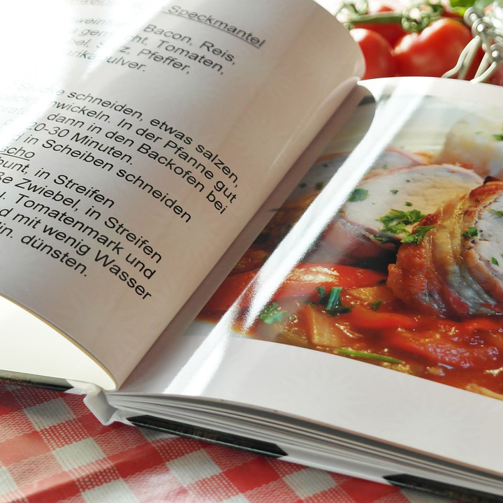 A close-up shot of an opened cookbook