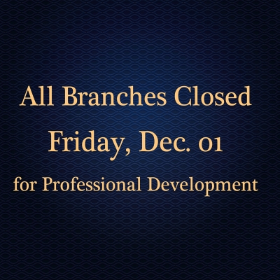 Sign stating that all branches of the library will be closed Friday, December 01, for Professional Development
