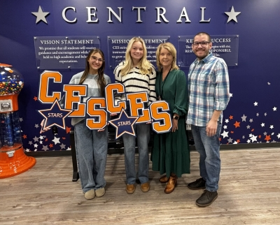 Marshall County Leadership Class, Kadence Cavitt and Briley Cathey along with CES principal Jill Darnall and library staff member, Nick Adams.