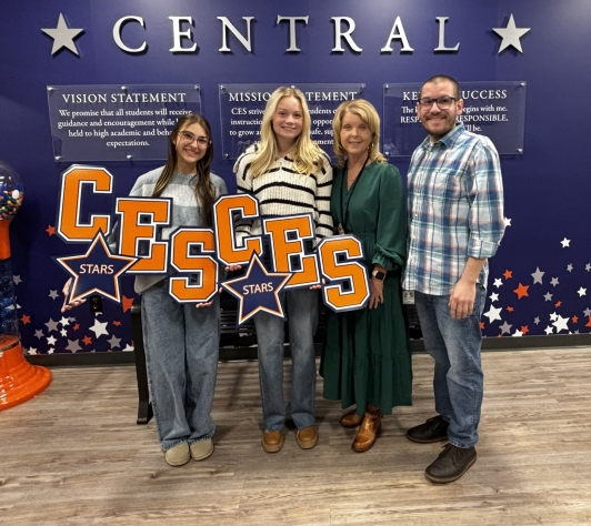 Marshall County Leadership Class, Kadence Cavitt and Briley Cathey along with CES principal Jill Darnall and library staff member, Nick Adams.
