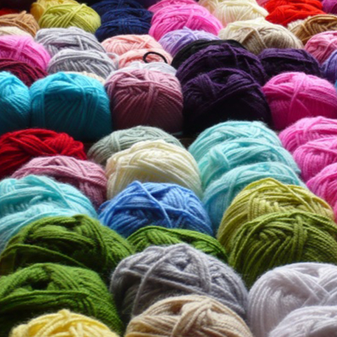 spools of yarn in various colors