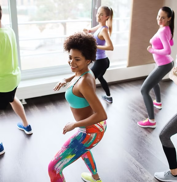 photo of a group of people exercising